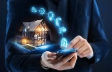 Smart home concept with person using smartphone.