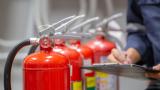 A row of fire extinguishers.