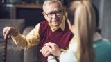 A man with a carer