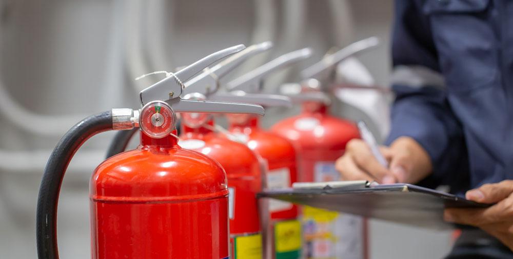 A row of fire extinguishers.