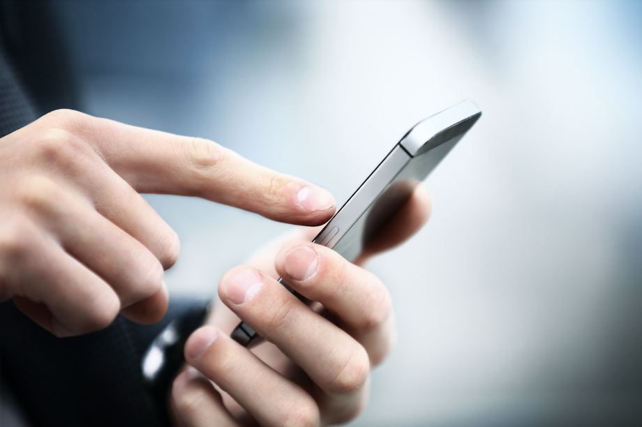 A person using a smart phone